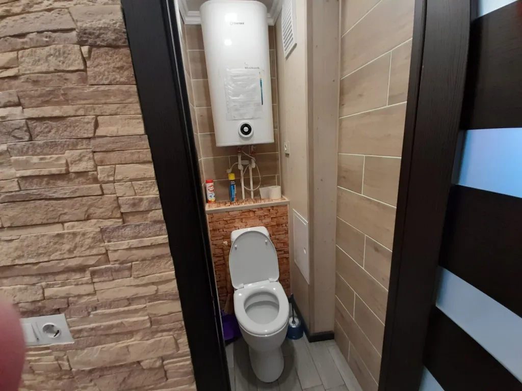 Квартира с балконом и видом на город и залив