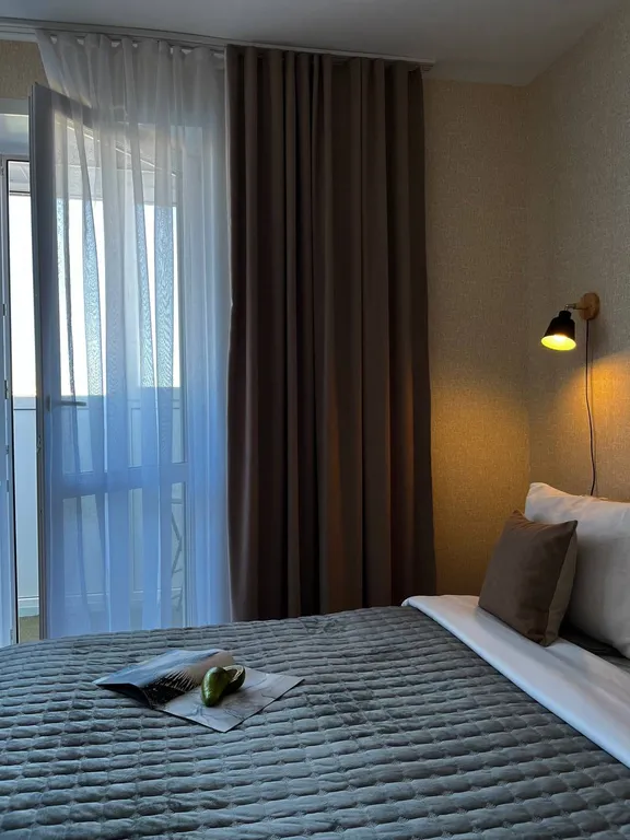 Уютная студия с видом на город