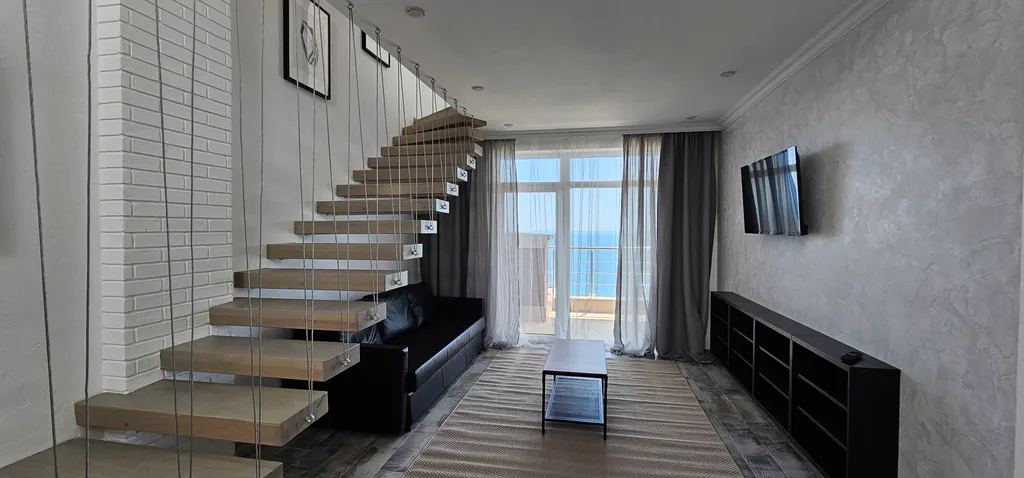 Двухуровневый апартамент с тремя спальнями