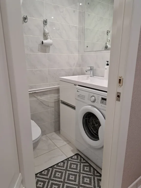 Стильная и уютная двухъярусная студия