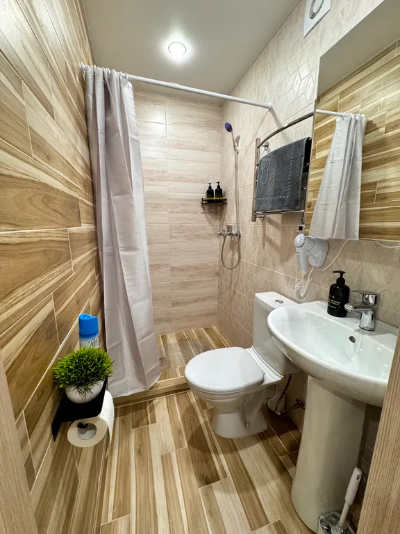 Современная студия в бежевых тонах в Люберцах