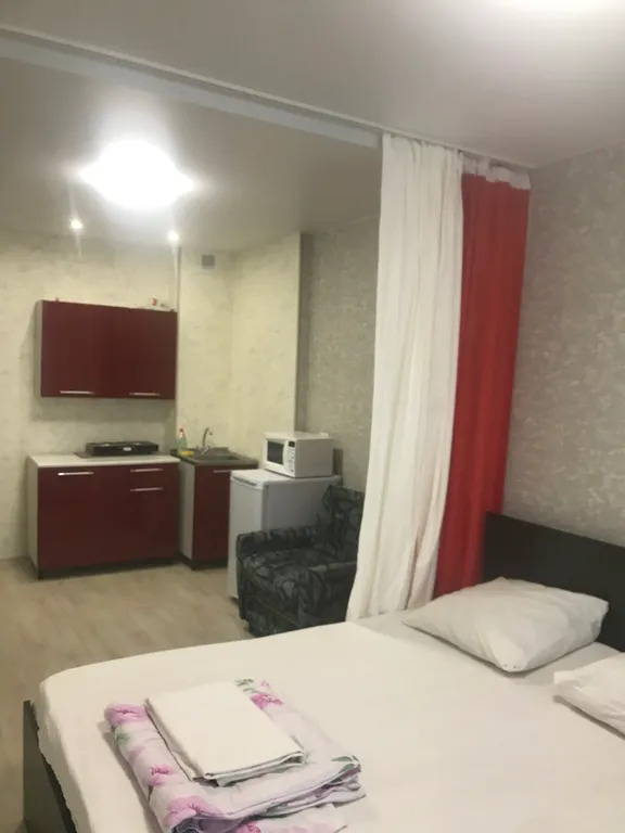 Уютная студия на высоком этаже