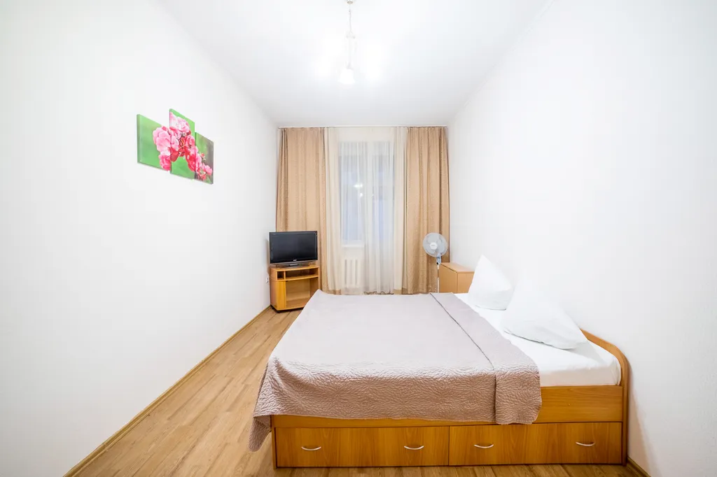 Светлая квартира в элитном доме с парковкой в самом центре — аренда посуточно в Томск