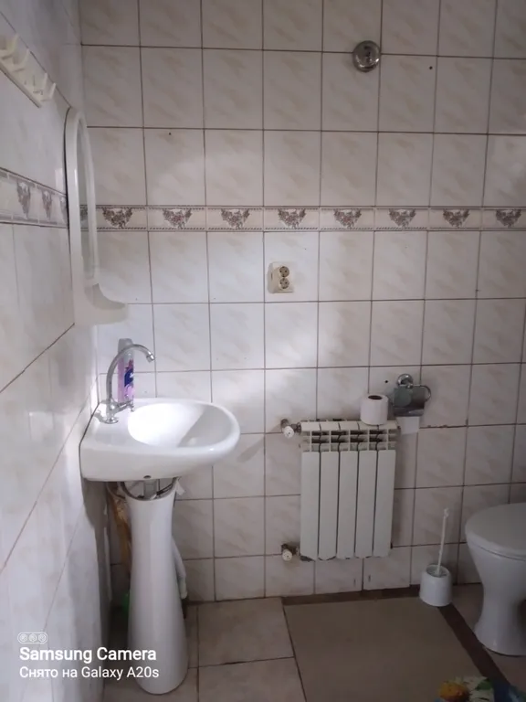 Дом у моря с площадкой в саду