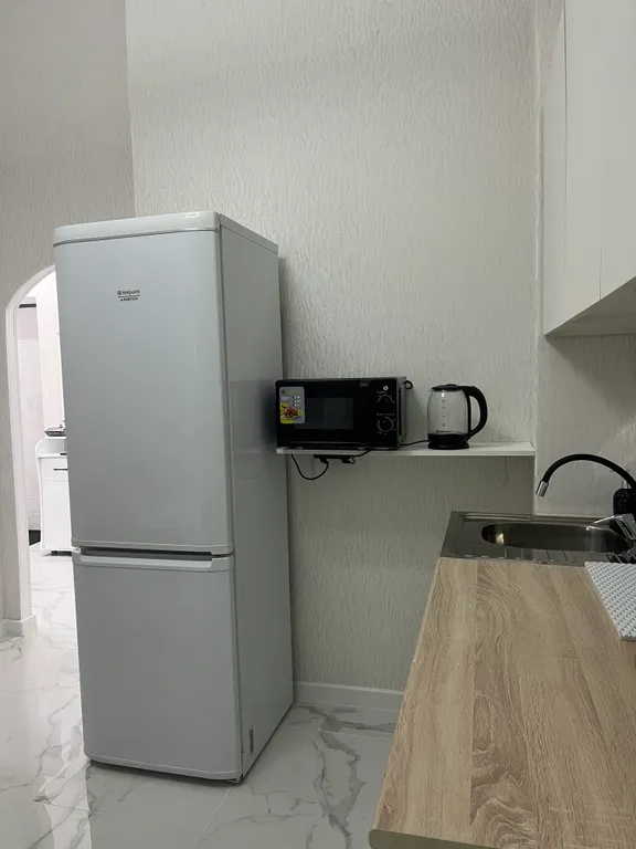 Светлая и уютная квартира с высокими потолками