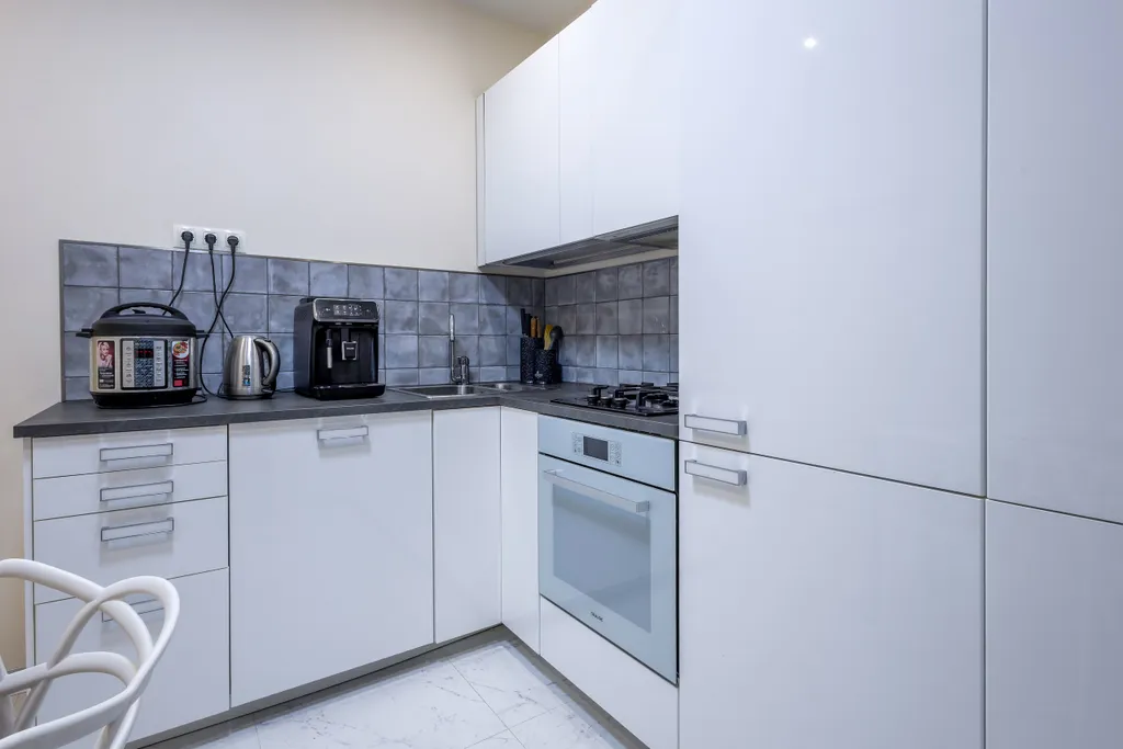 Квартира MyHomeYourHome в клубном доме с бассейном