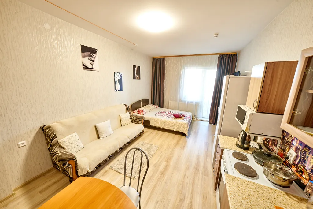 Современная студия с балконом на 21 этаже  в самом центре города