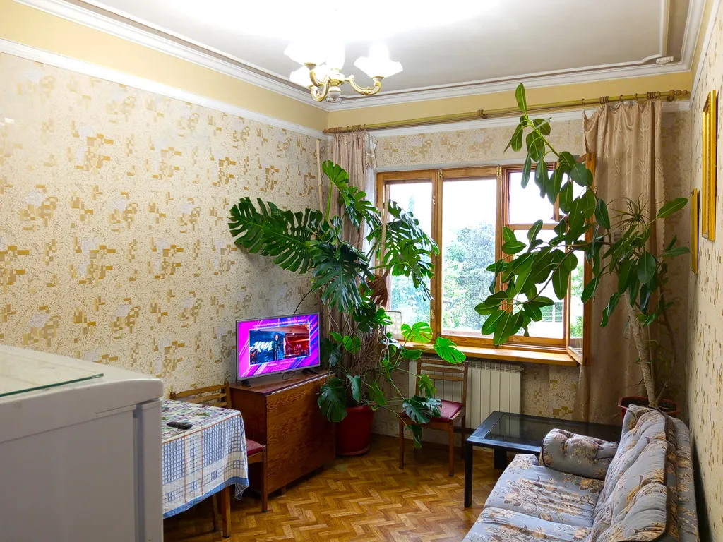 Квартира с мангальной зоной, гаражом и личным местом отдыха во дворе