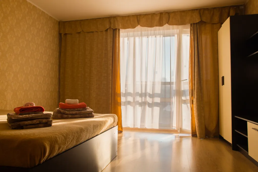 Светлая квартира с панорамными окнами в 10 минутах от парка в центре