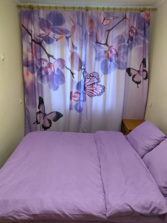 Скромная квартира с изолированными комнатами в центре