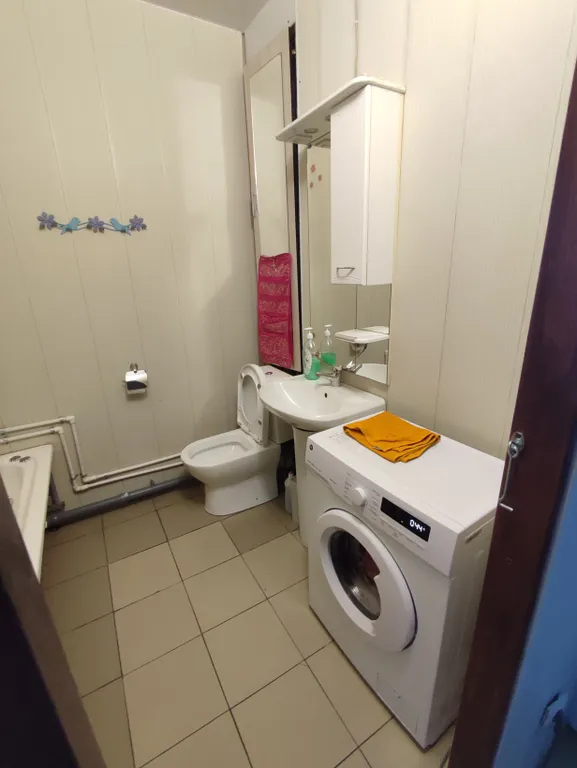 Студия в современном новом доме на проспекте Строителей