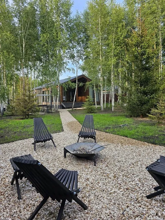 Дизайнерский панорамный дом с сауной в хвойном лесу