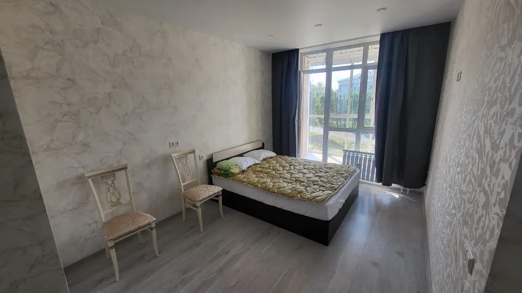 Уютная квартира в новом доме с панорамными окнами