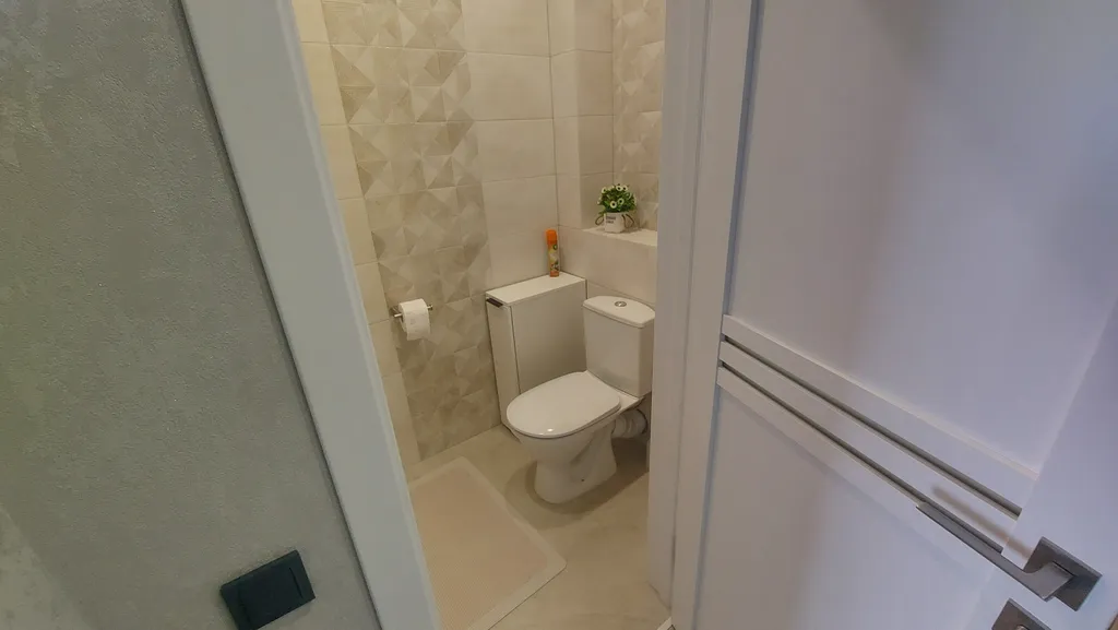 Квартира с видом на город и рощу