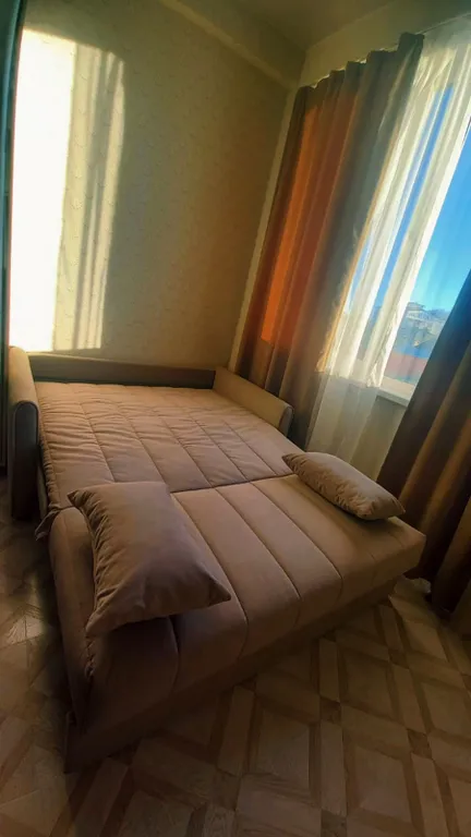 Четырехместная однокомнатная квартира с балконом в центре