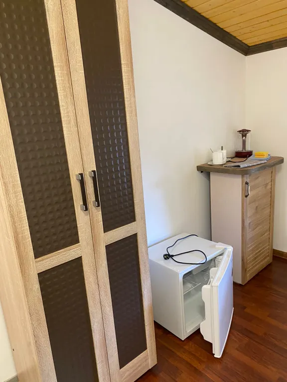 Номер отельного типа с видом на Домбай и лес