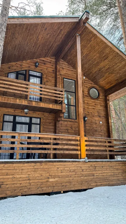 Двухэтажный коттедж в сосновом бору