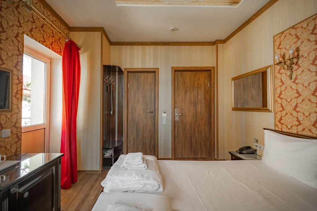 Двухместная комната с двуспальной кроватью НР