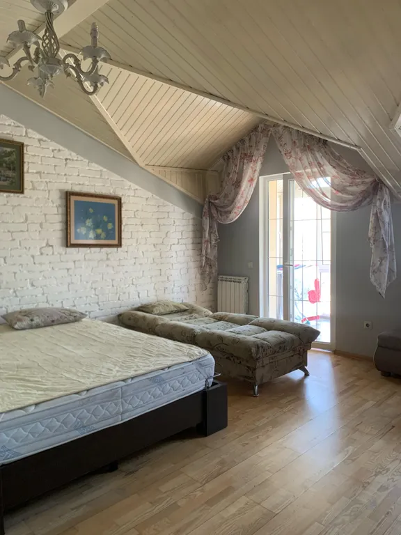 Двухкомнатная квартира с мансардой и парковкой