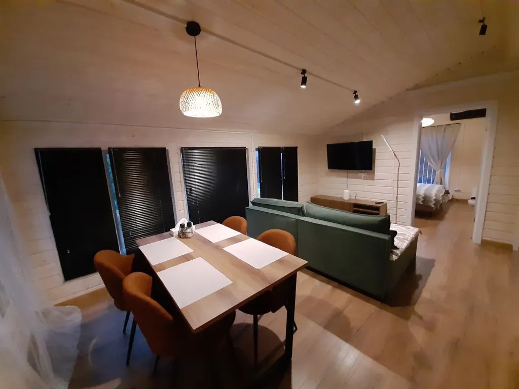 Дом в  соснах.