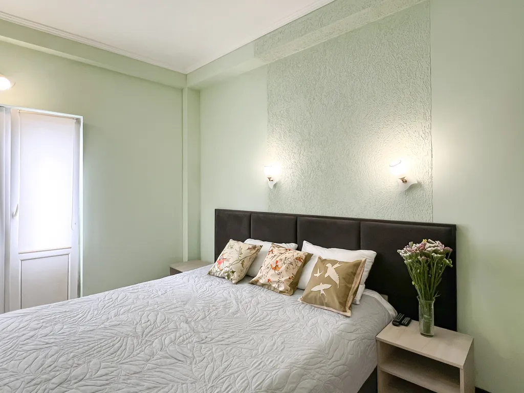 Семейный номер с кухней в центре