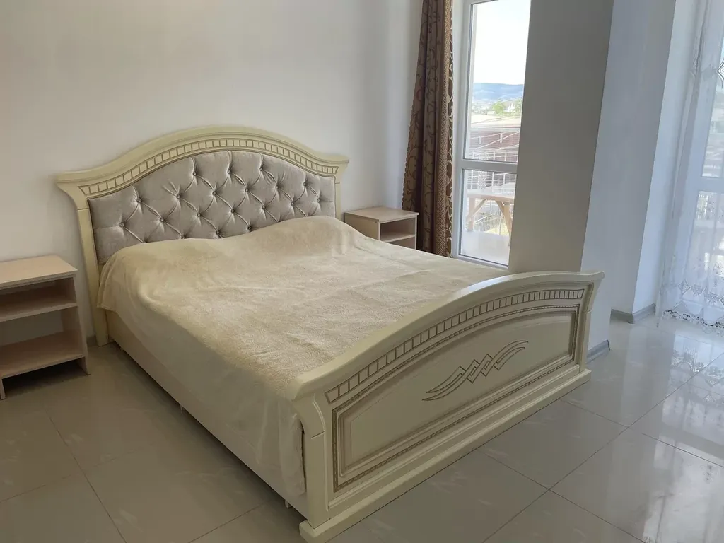 Стандартный двухместный номер с балконом и видом на поселок