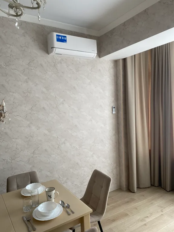 Двухкомнатная квартира с балконом в центре города