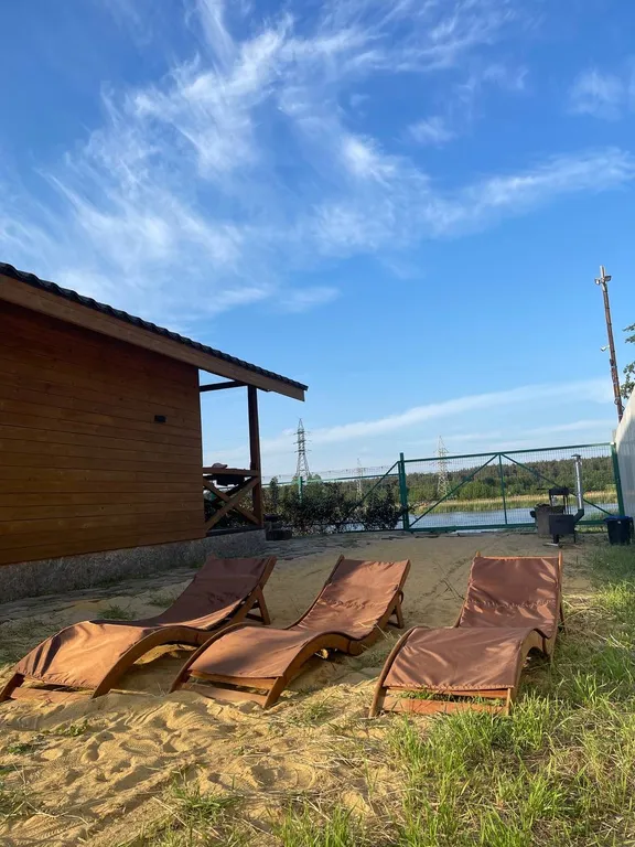 Шале на берегу реки с банным чаном и дровяной баней