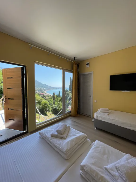 Квартира Квартира Стандарт с боковым видом на море — Гагра