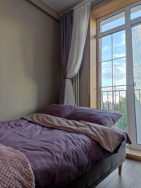 Сиреневая квартира с панорамой на город