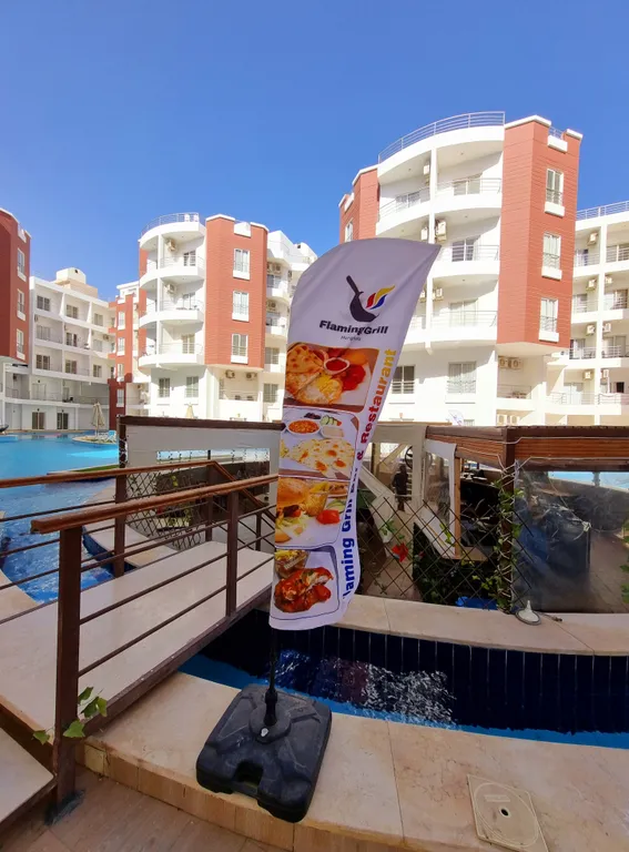 Уютная студия в тихом районе с бассейном и спортзалом в Хургаде