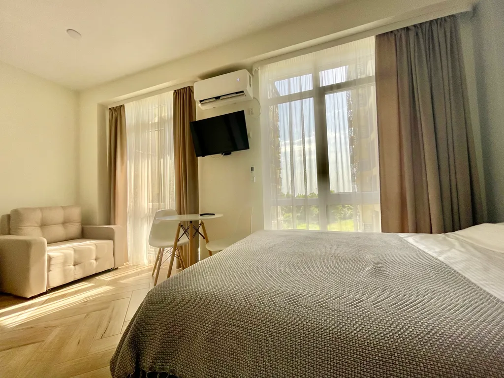 Квартира Квартира Уютная студия в ЖК Сорренто парк — Сириус