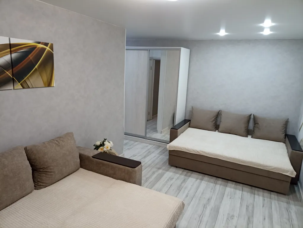 Квартира в центре на первом этаже с асфальтированной парковкой