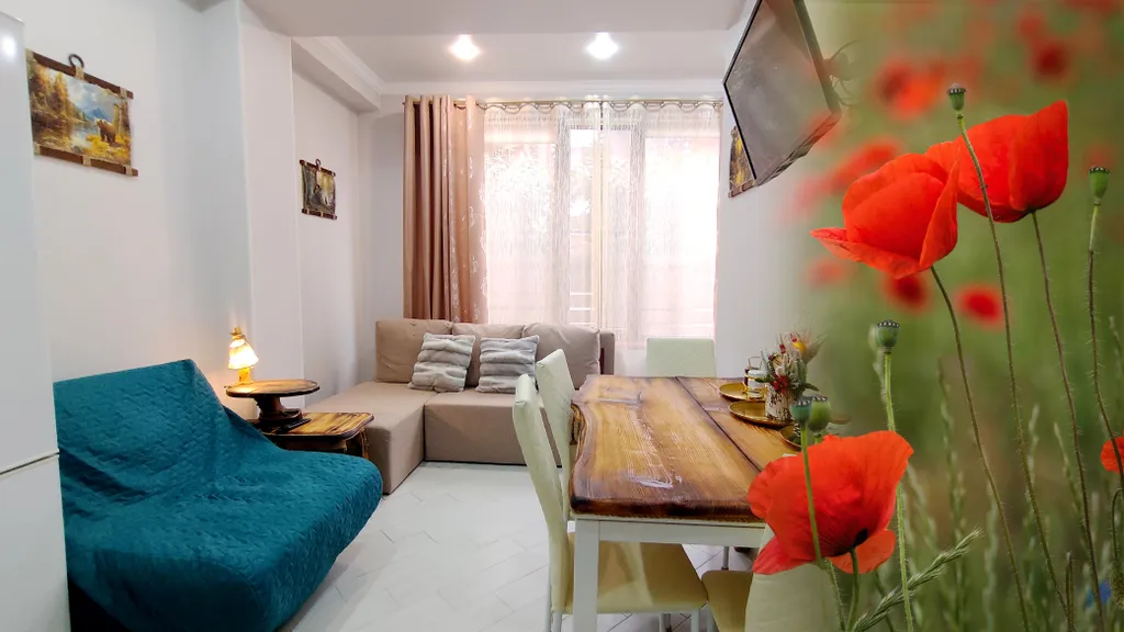 Квартира Идеально расположенный комфортный апартамент со спальней. Большие окна — аренда посуточно в Красная Поляна