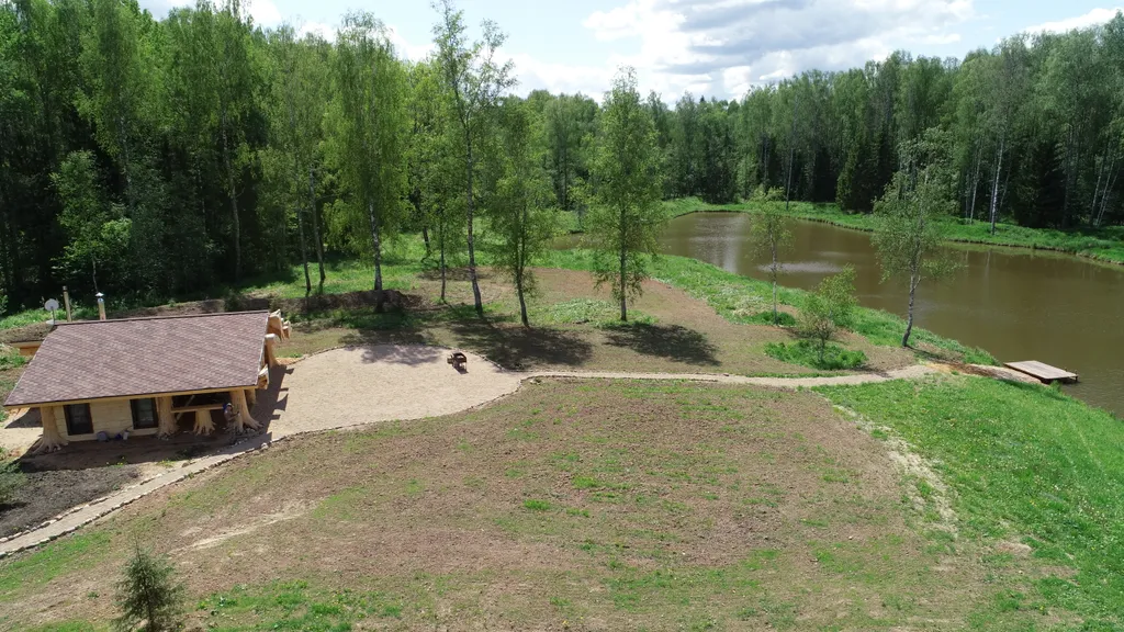 Дом с панорамными окнами с купелью