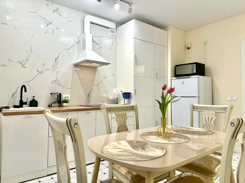 Светлые современные апартаменты в центре города