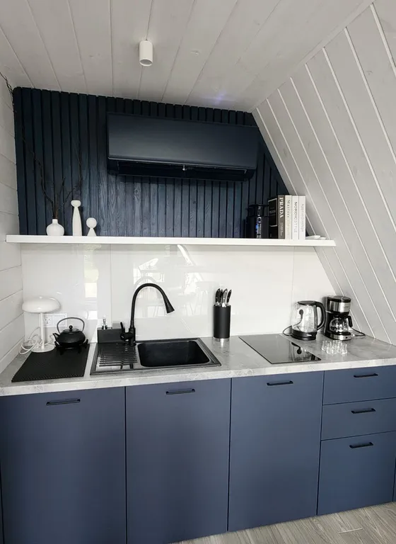 Уютный треугольный дом в 25 км от Минска с видом на лес.