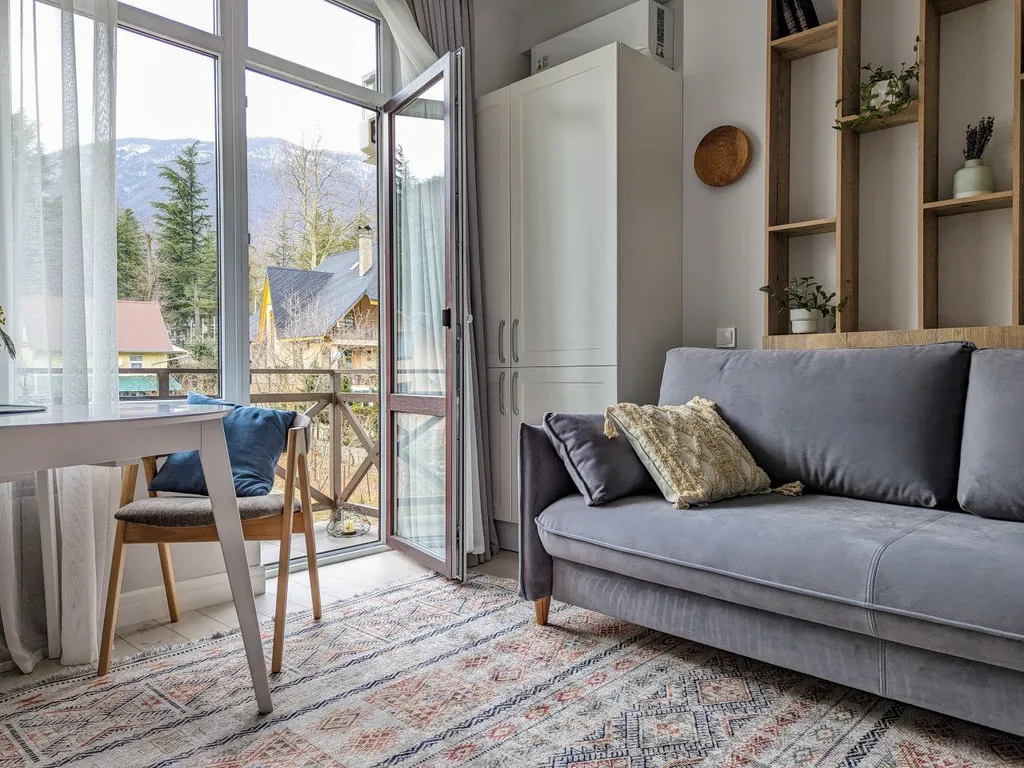 Двухуровневая квартира с балконом в центре