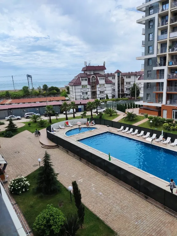 Уютная студия с видом на бассейн