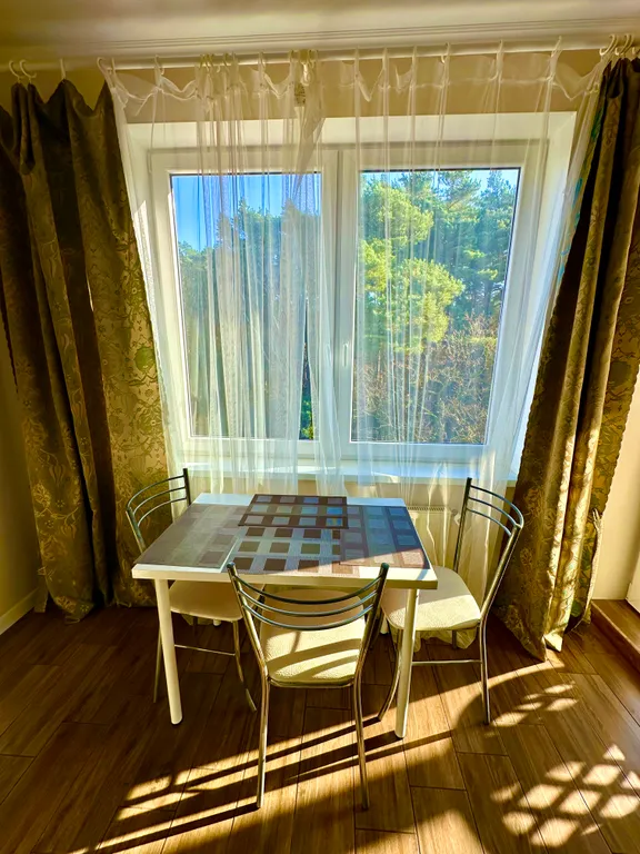 Уютная квартира с видом на сосновый лес