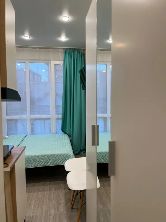 Студия для двоих с панорамным окном