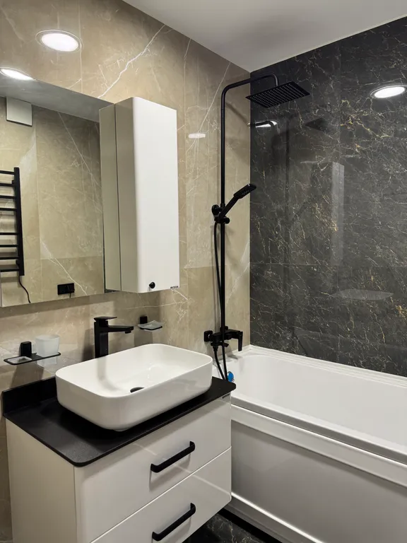 Уютная квартира с дизайнерским ремонтом в центральном районе города