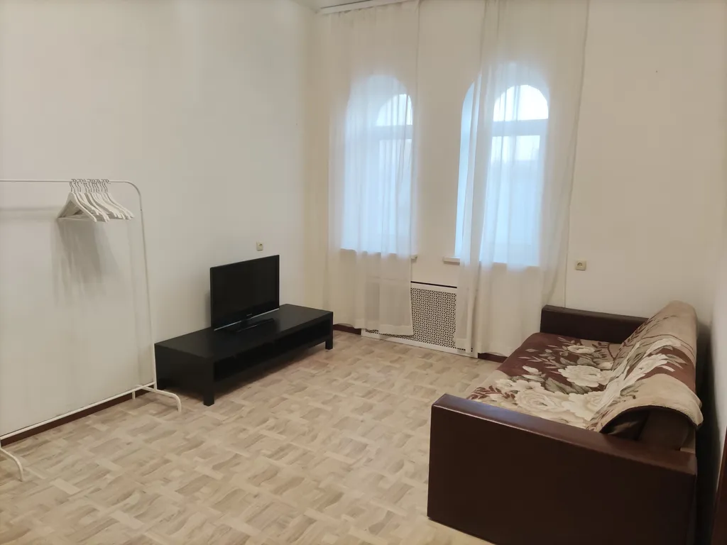 Мансарда в сталинке с арочными окнами