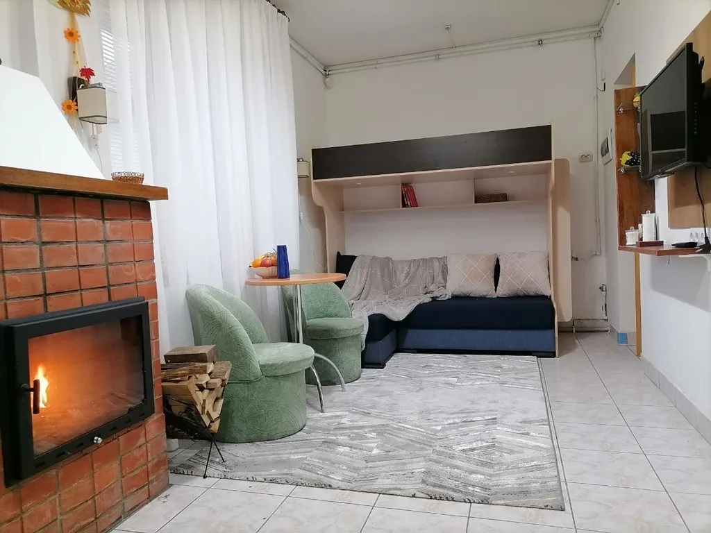 Апартаменты с камином в историческом центре.