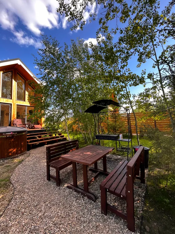 Дом с купелью на берегу реки