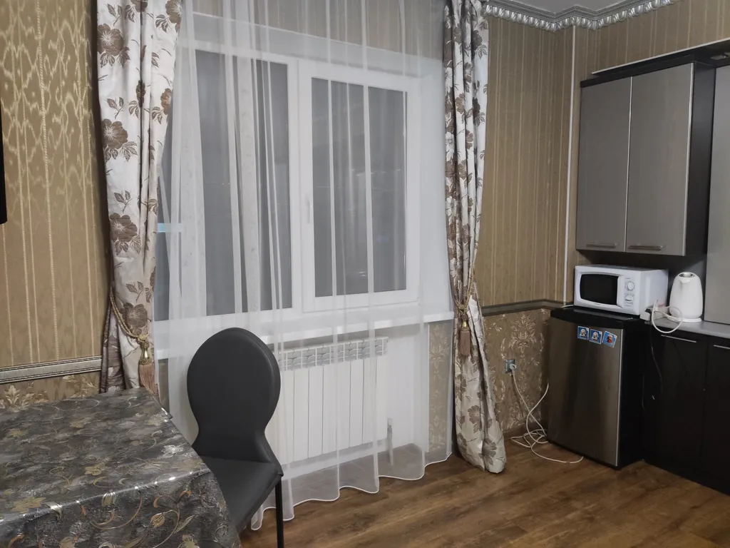 Уютная студия с видом на город