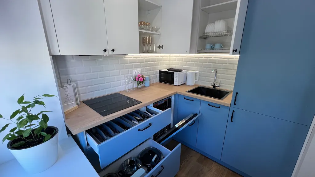 Апартамент у часовой башни и дома гильдии