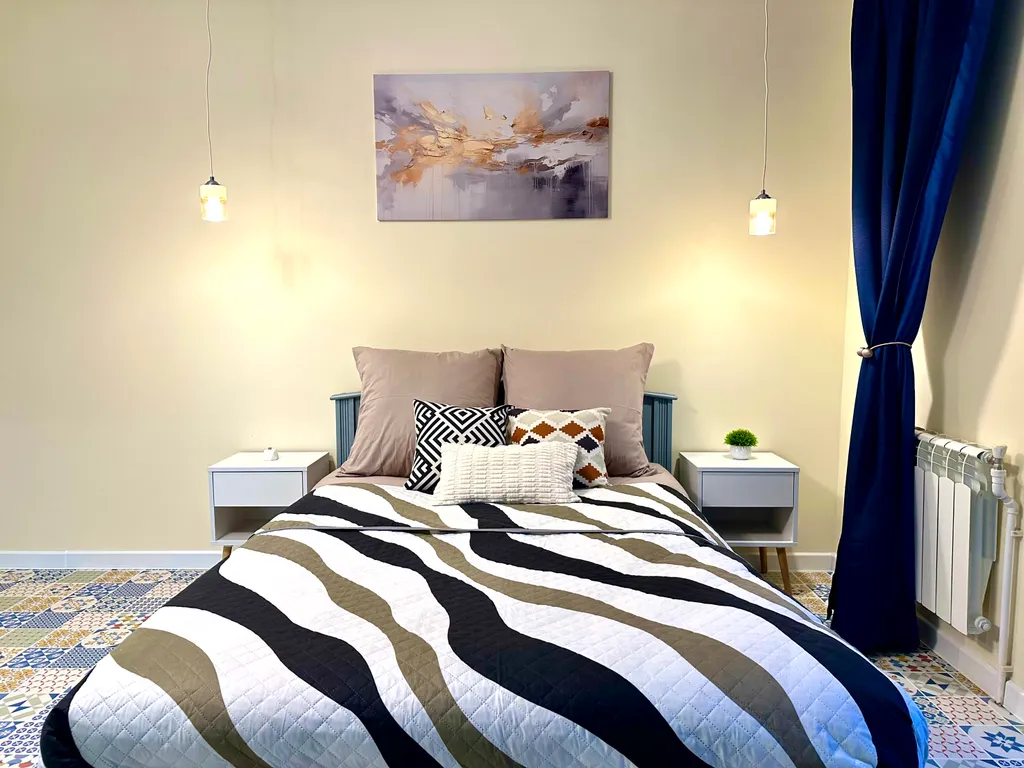 Светлые современные апартаменты в центре города