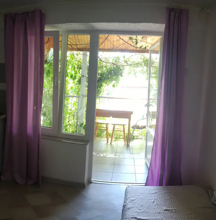 Номер в коттедже с балконом