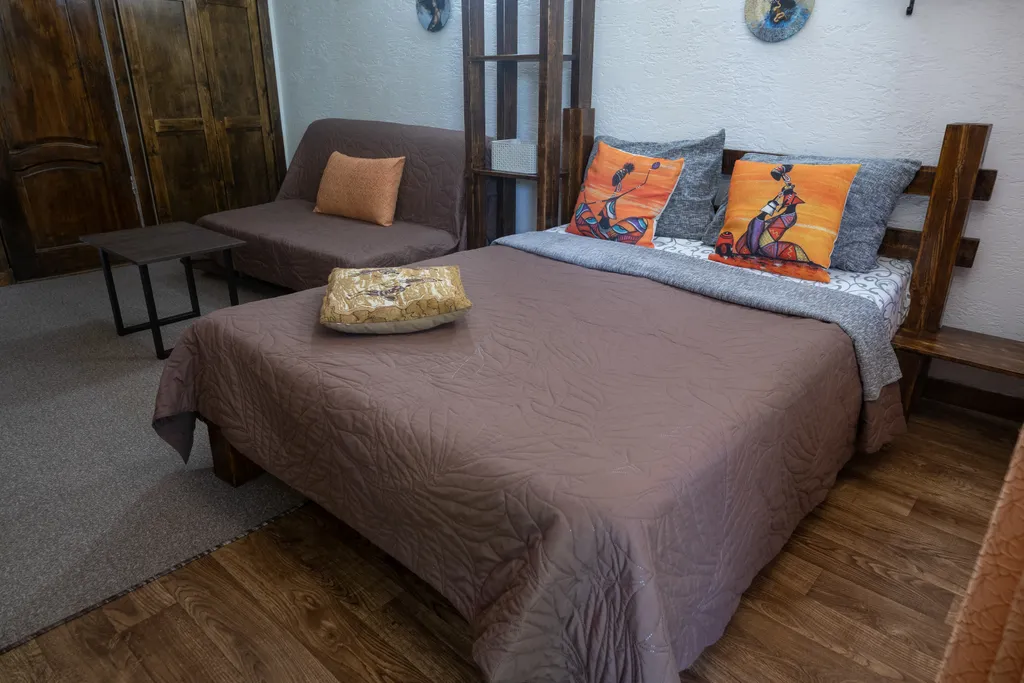 Квартира Квартира Четырёхместный номер с двухспальной кроватью и двухспальным диваном — Сухум